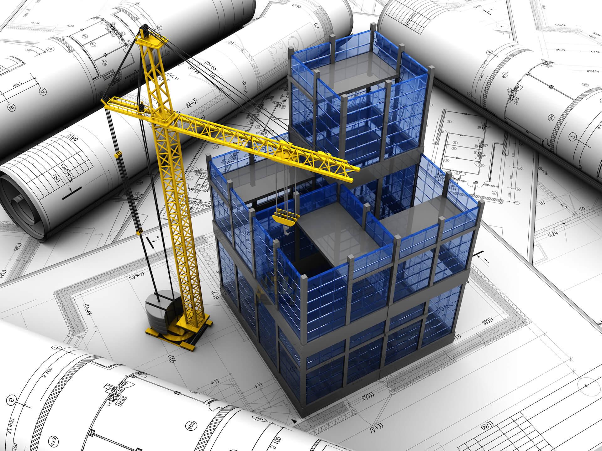 مهندس عمران در حال بررسی نقشههای پروژه ساختمانی